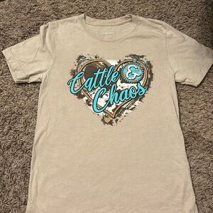 Girls T-shirt with cow print heart.